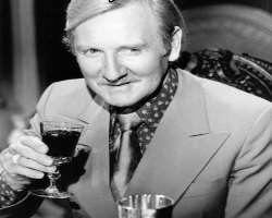Leslie Phillips consuming alcohol